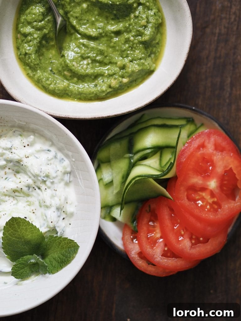 Lamb Burgers: A Fresh Mediterranean-Italian Blend 9 Lamb burger fixings on small plates.