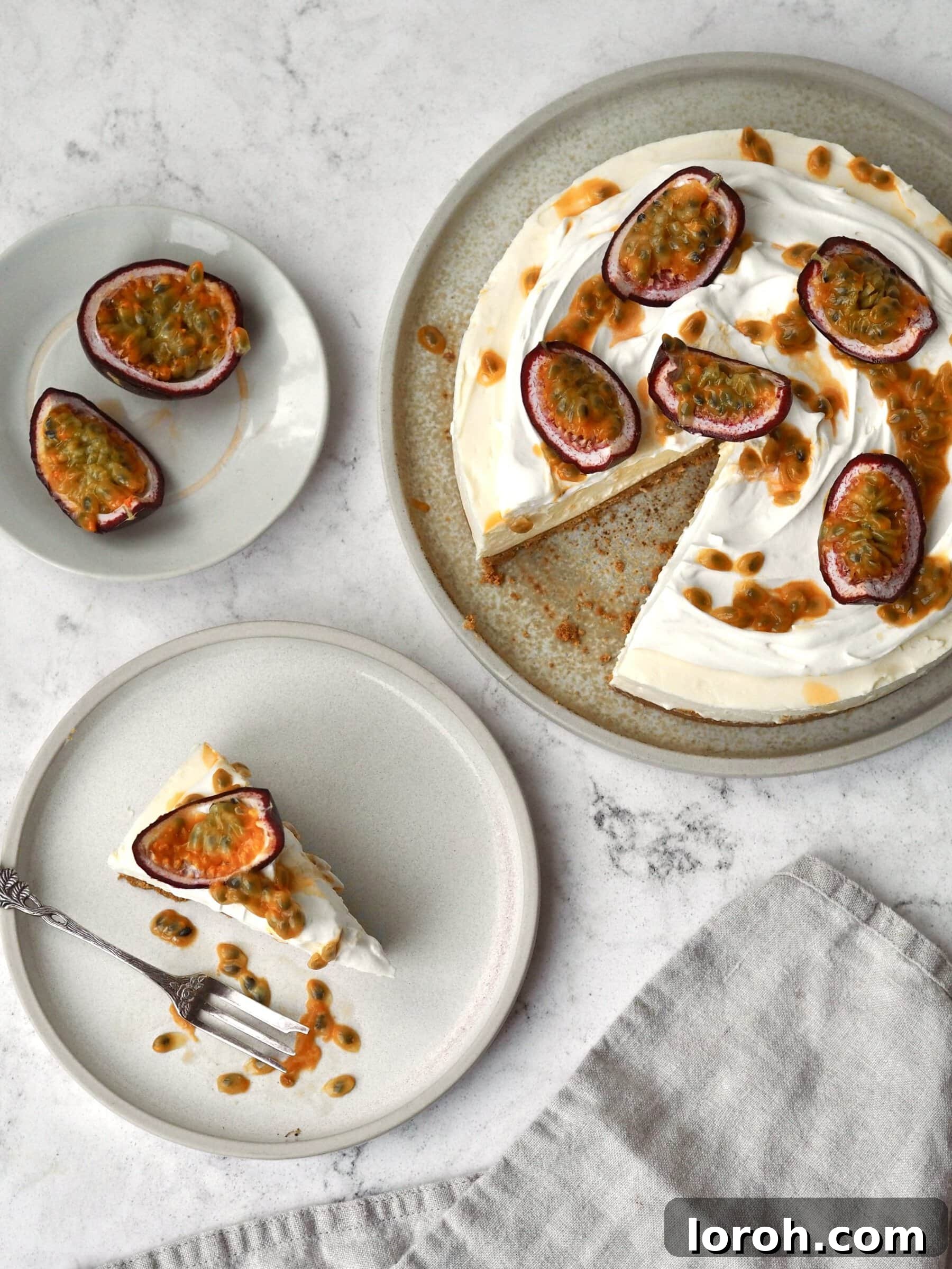 Individual slices of White Chocolate and Passion Fruit Cheesecake, beautifully garnished and ready to be served on a white plate.