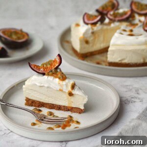An appealing close-up of a White Chocolate and Passion Fruit Cheesecake, sliced and ready to serve.