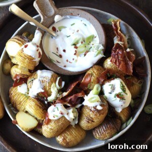 Air Fryer Hasselback Potatoes with crispy prosciutto and fresh herbs