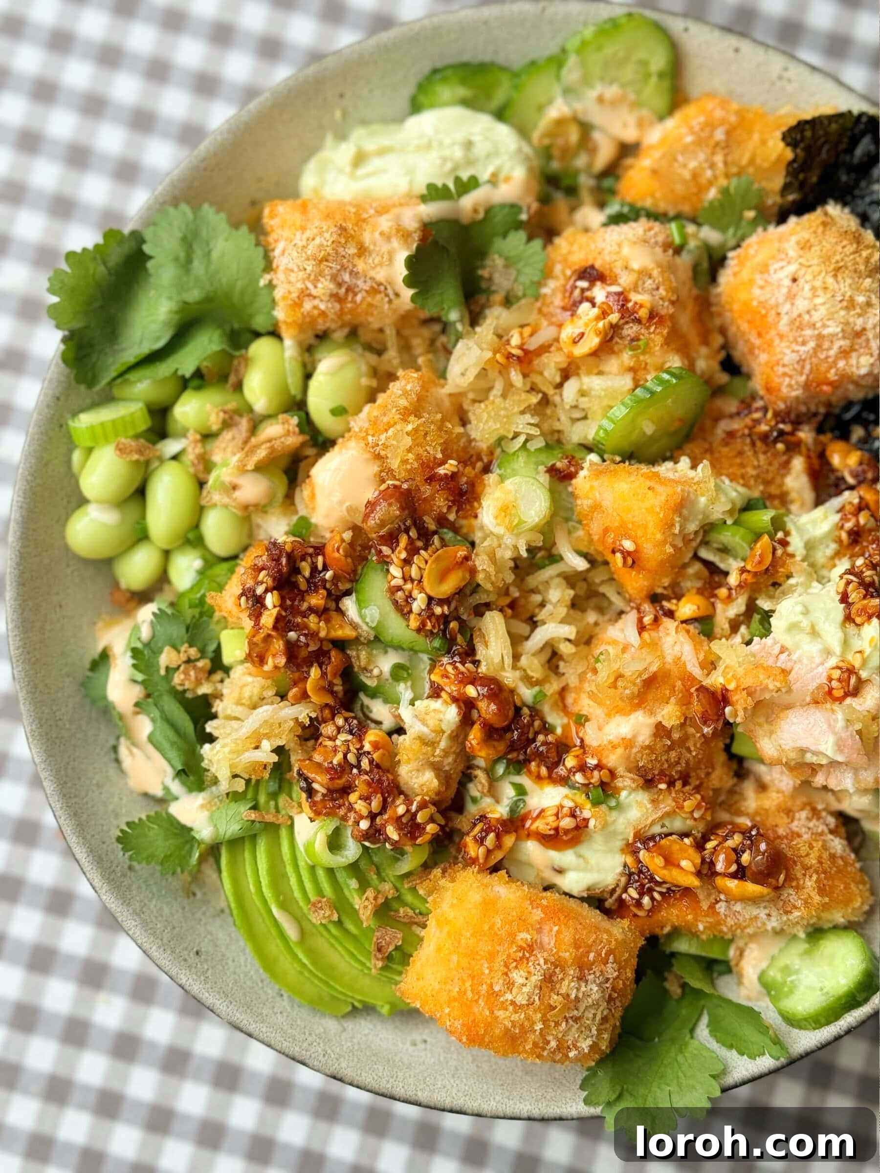 Salmon Crunch Bowl 12 Crunchy Salmon Roll (in a bowl) with edamame and chilli oil.