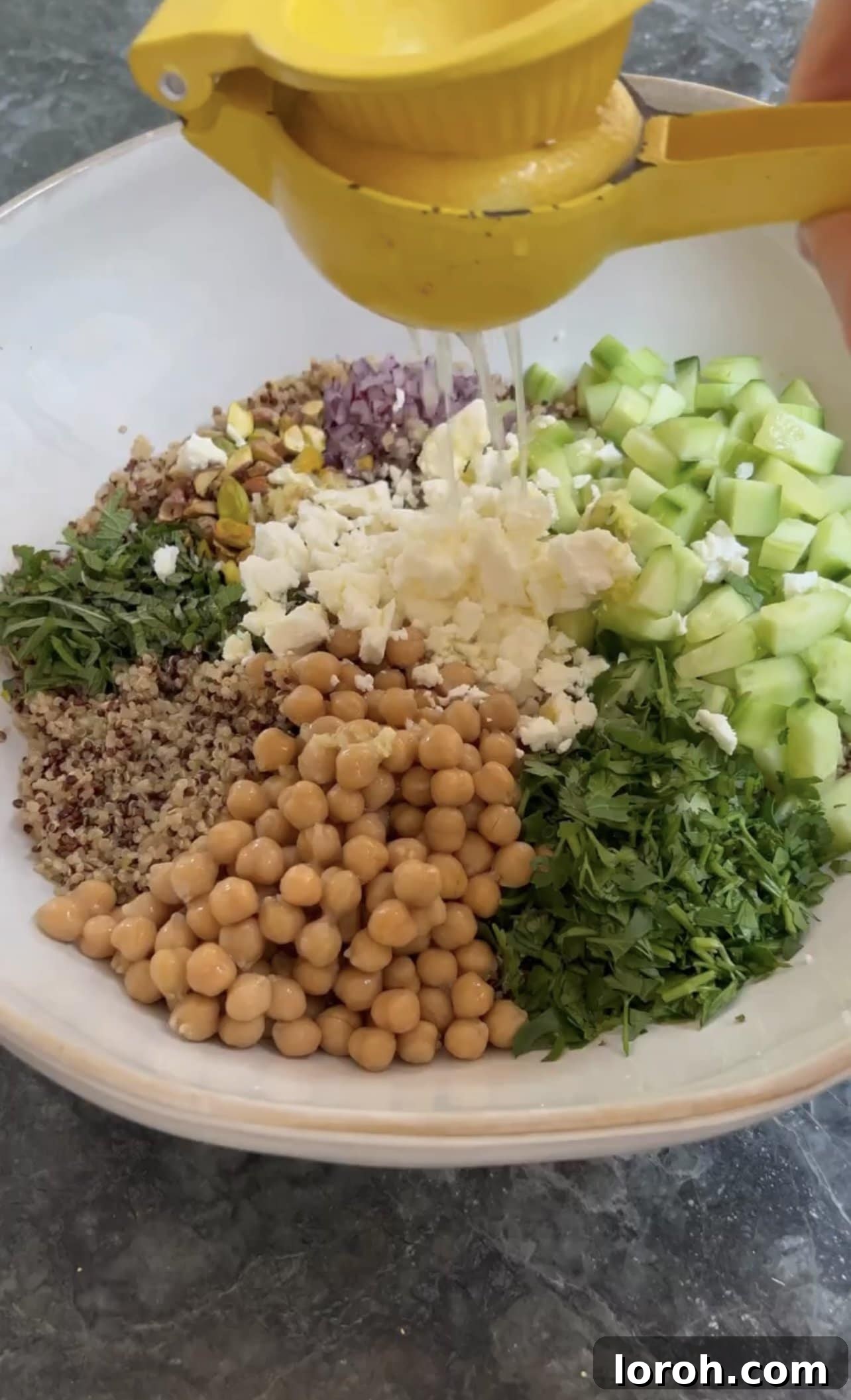 Aniston's Signature Salad 2 Fresh Jennifer Aniston Salad in a large bowl, ready to be served.