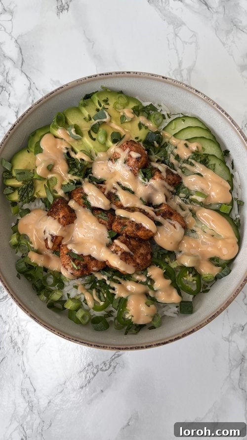 Fiery Salmon Power Bowl 2 spicy salmon bowl in a grey bowl.