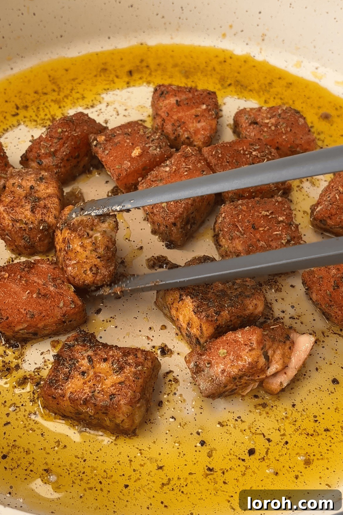 Fiery Salmon Power Bowl 4 frying the salmon chunks.