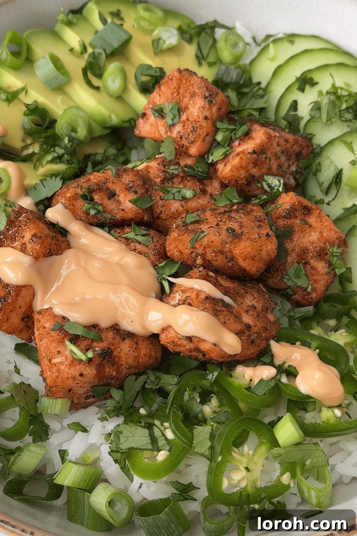 Fiery Salmon Power Bowl 6 plate up the spicy salmon bowl.