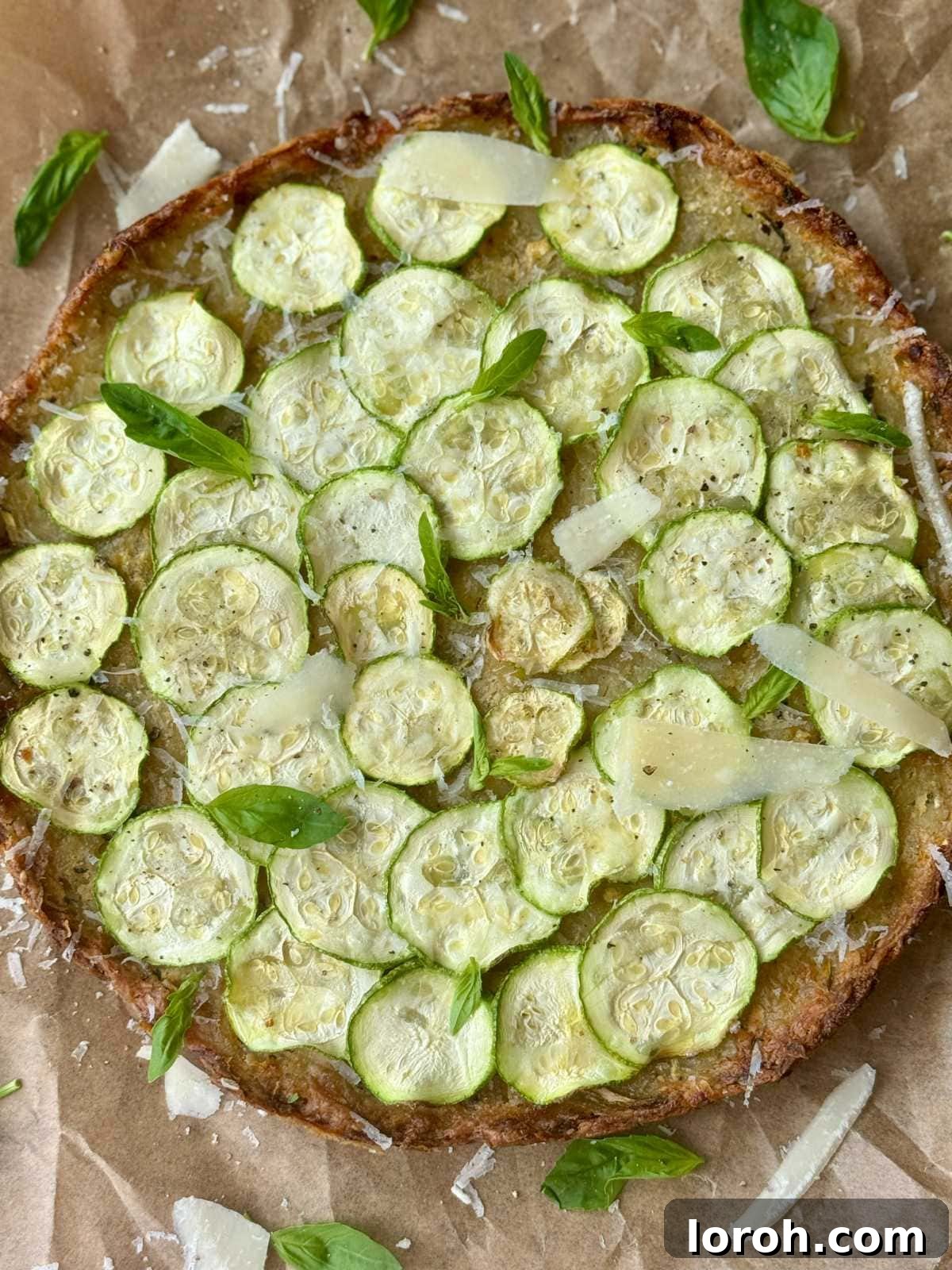 Rustic Italian Zucchini Tart 3 A slice of Scarpaccia, revealing its crispy texture and the layers of zucchini and potato, presented on a wooden board.