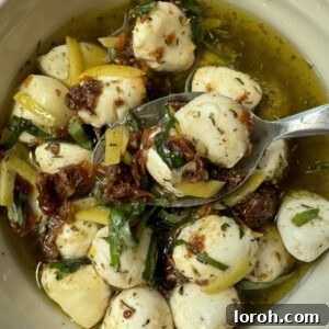 marinated mozzarella balls in a bowl ready to serve