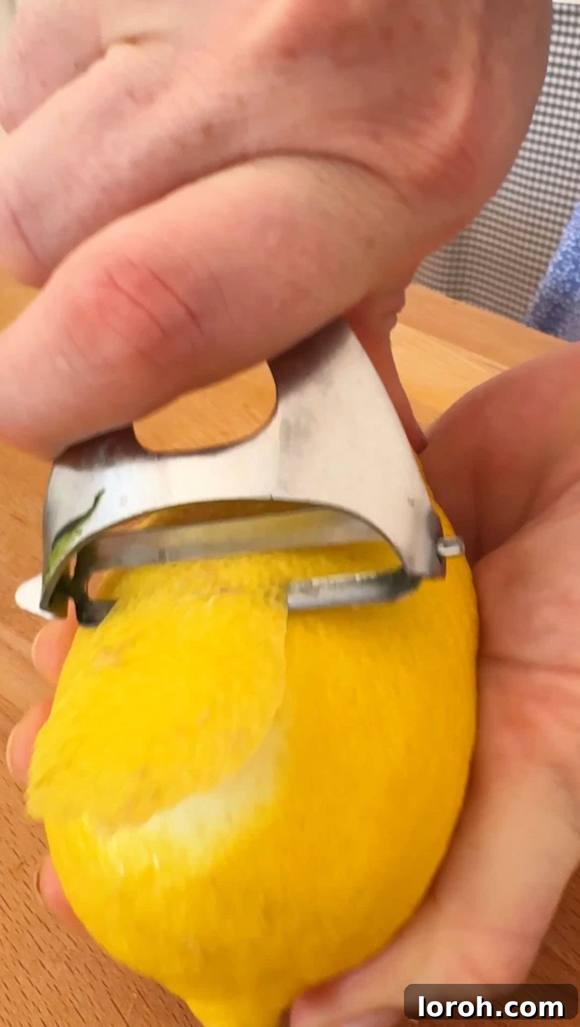Marinated Mozzarella Bites 5 peeling the lemon for its rind