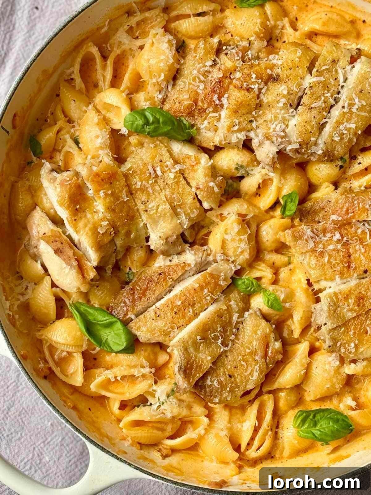 Chicken Parmesan Garlic Pasta served in a pan, ready to be dished.