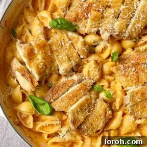 Chicken Parmesan Garlic Pasta in a pan, ready to serve.