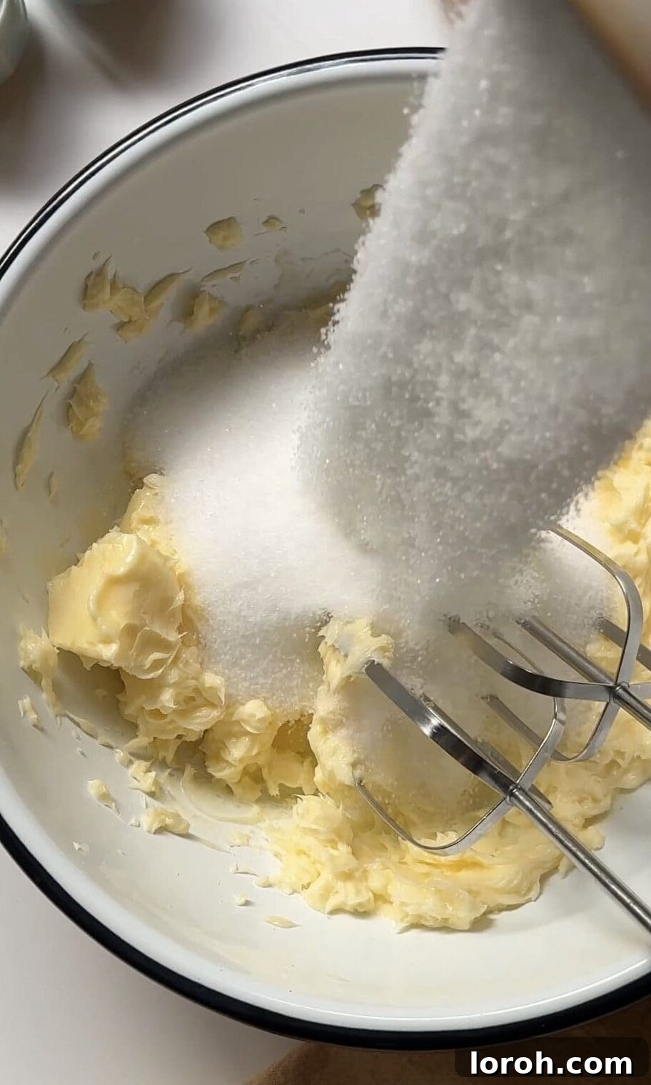 beating butter and sugar.