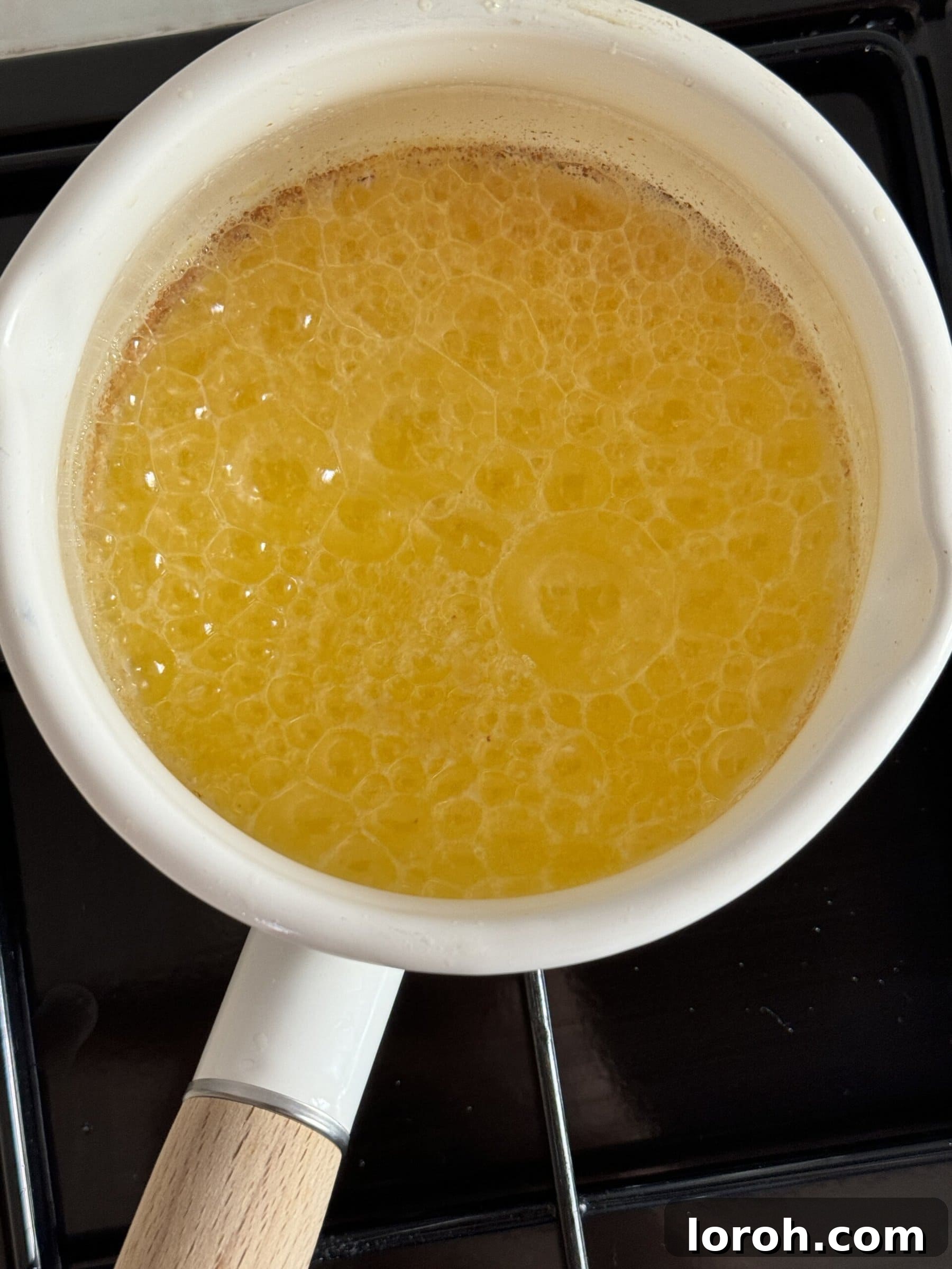Foaming butter in a saucepan.