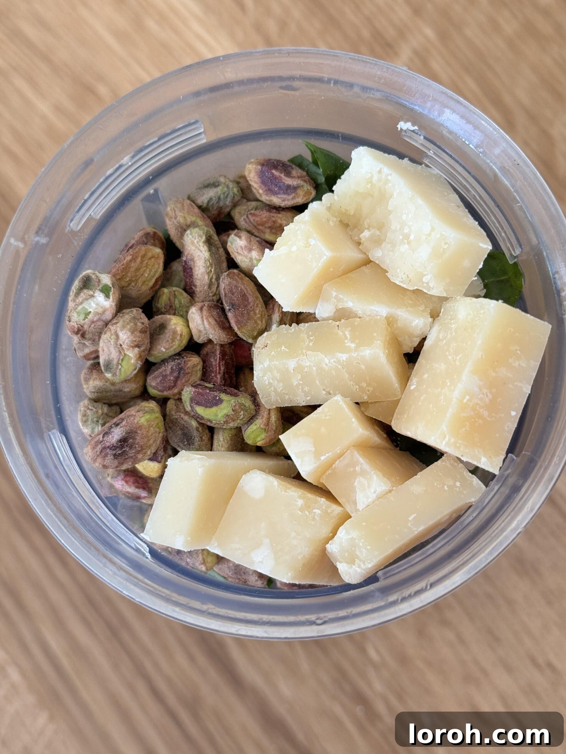 Emerald Pistachio Pesto 6 pistachios and parmesan added to the blender for pistachio pesto