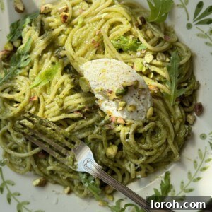 A plated dish of Pistachio Pesto Pasta, ready to be enjoyed.