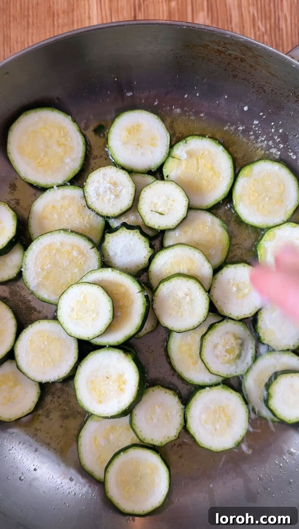 Creamy Zucchini Risotto 5 frying zucchini slices in a pan