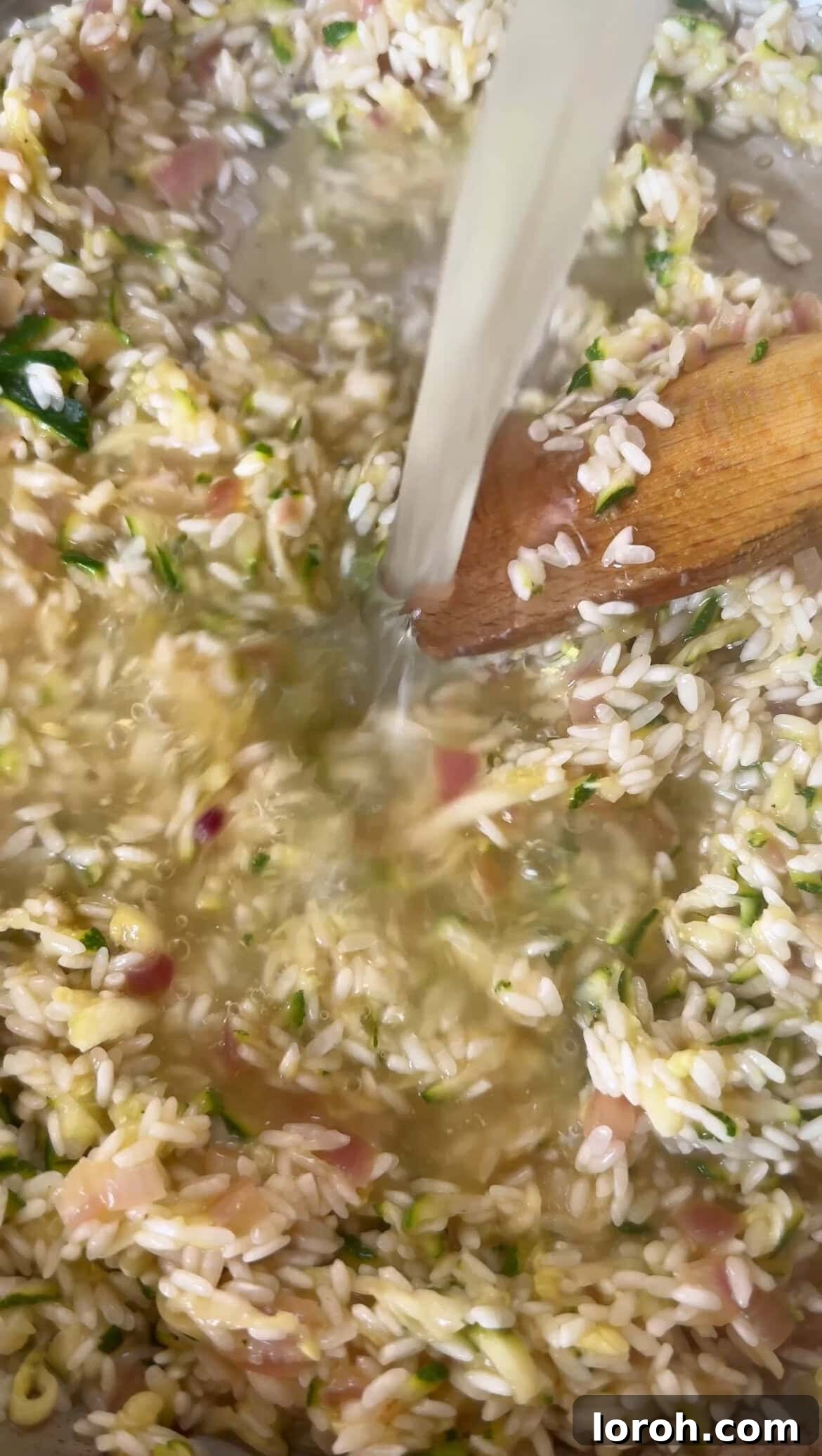 Creamy Zucchini Risotto 8 adding hot stock to risotto rice