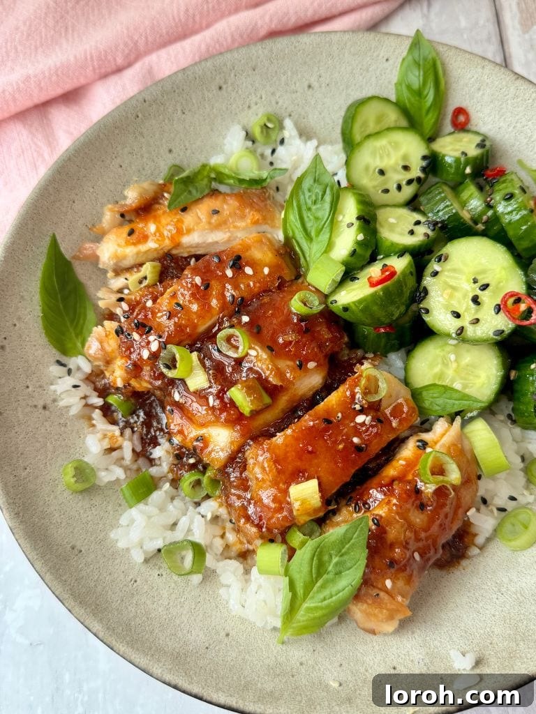 Sticky Soy Garlic Chicken 4 Soy and Garlic Chicken Meal in a bowl with vibrant garnishes
