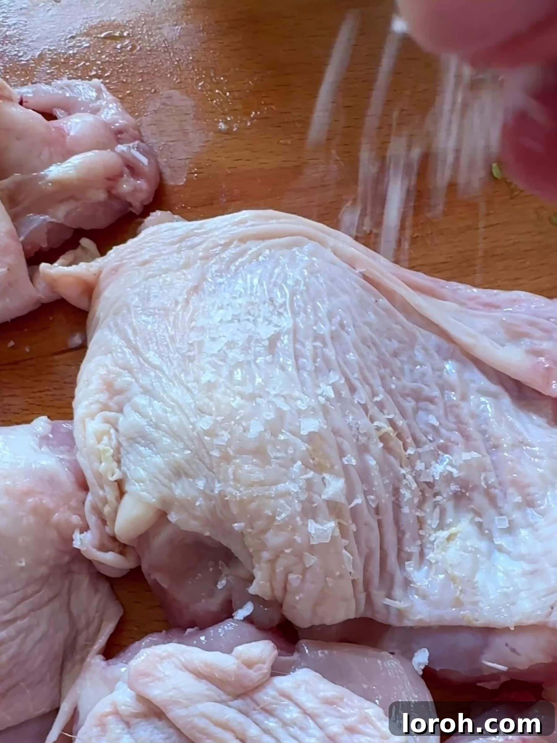 Sticky Soy Garlic Chicken 6 Step two: patting chicken thighs dry and salting generously