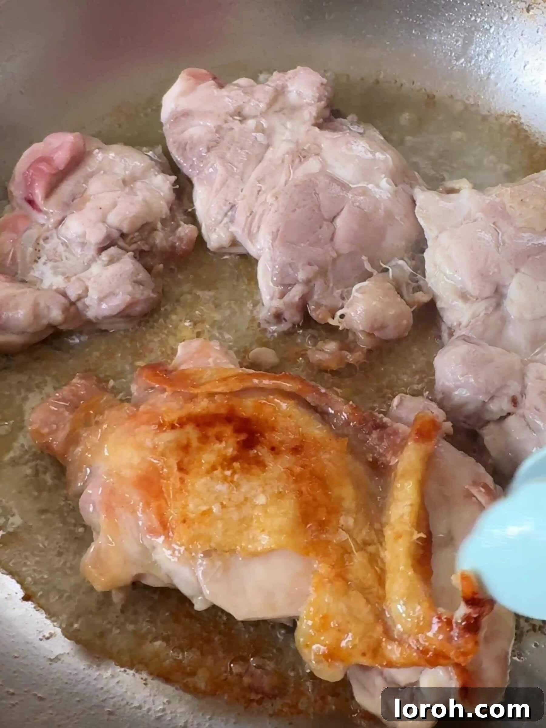 Sticky Soy Garlic Chicken 8 Step four: flipping chicken and cooking until thoroughly done