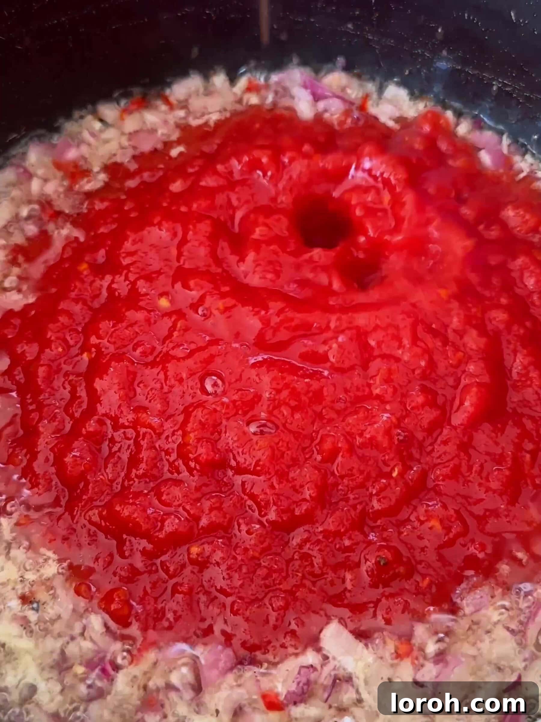 Spicy Tomato Chicken Kofta Bowls 7 Simmering the homemade chilli tomato sauce.