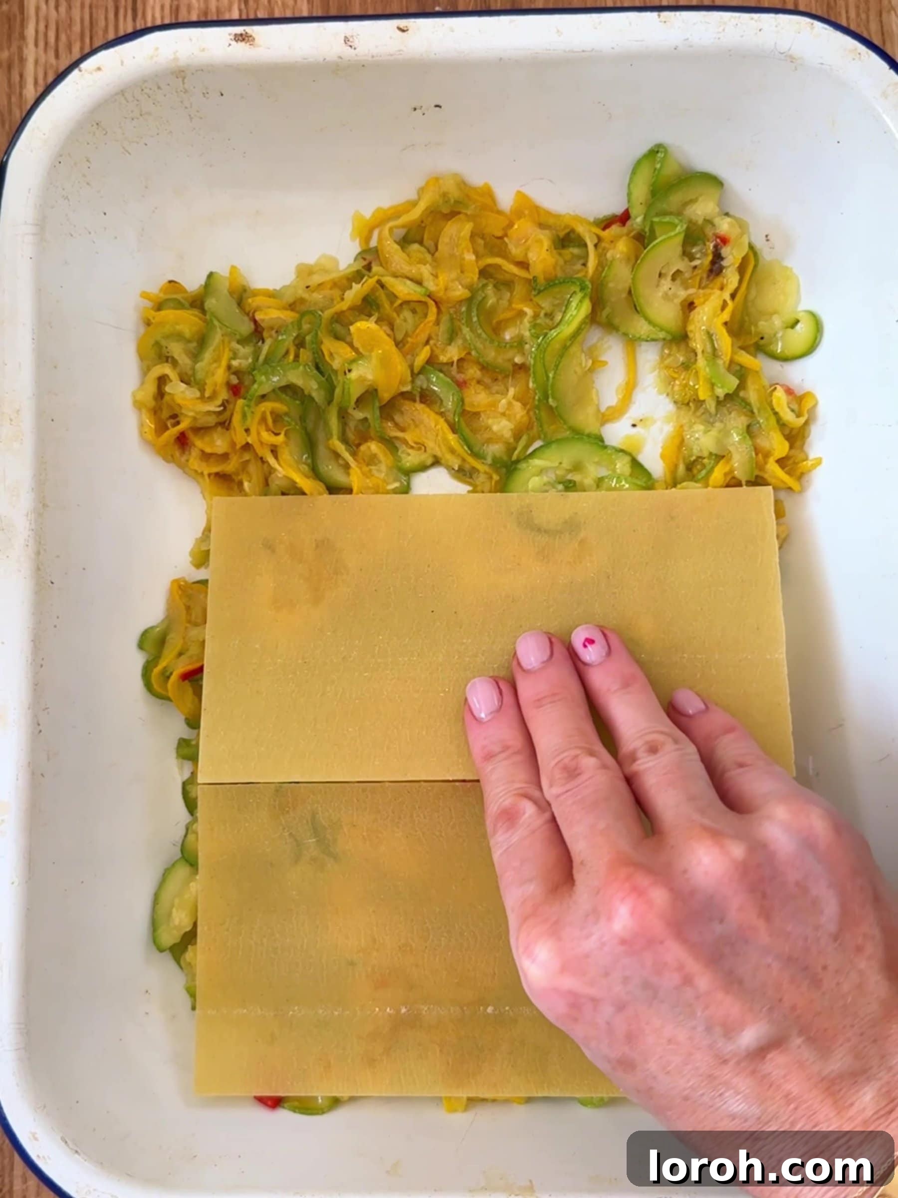 Garden Fresh Zucchini Lasagna 9 Layering the Courgette Lasagne components in the baking dish
