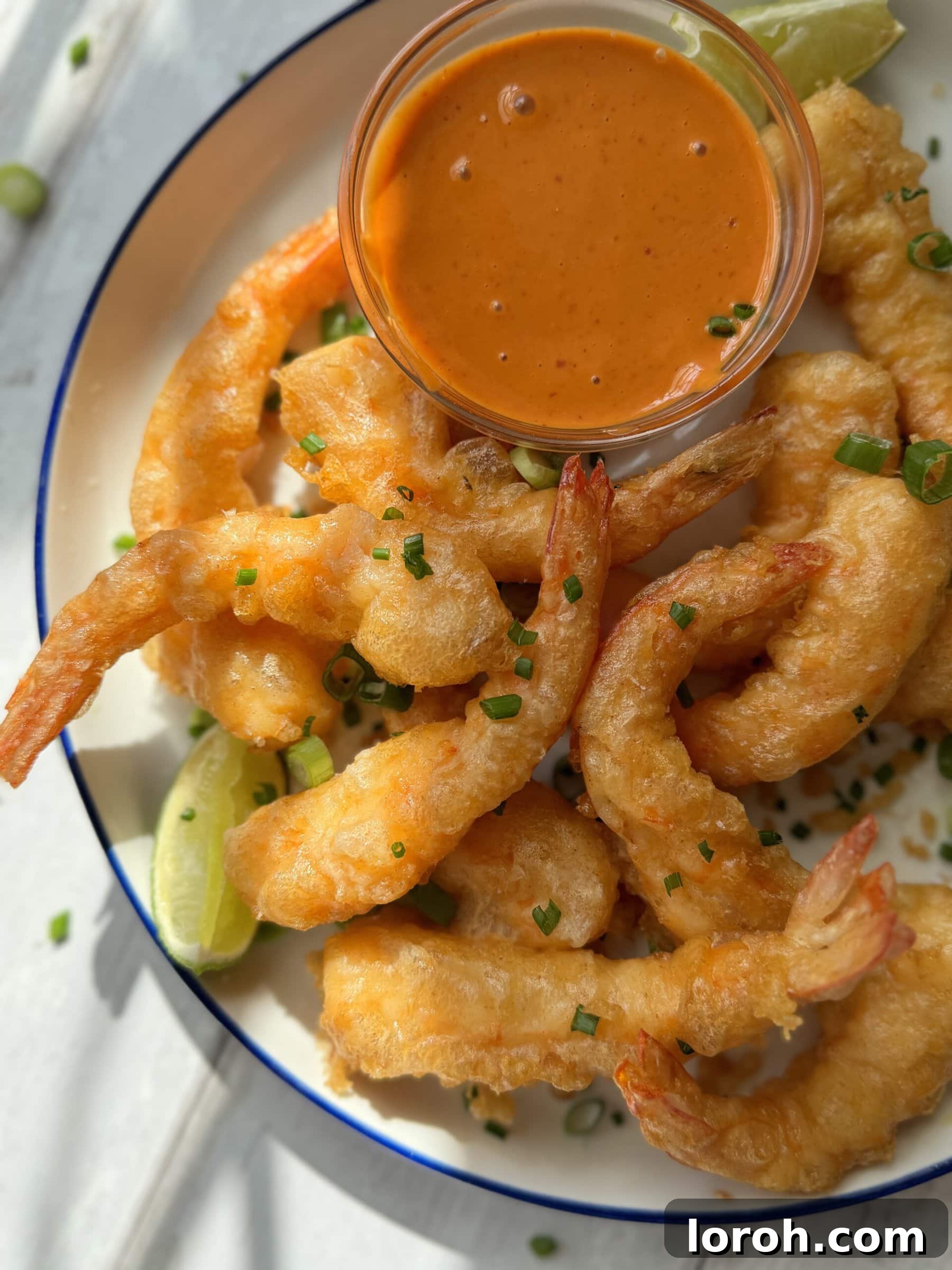 Golden Crispy Ebi Tempura 2 Crispy Japanese Shrimp Tempura (Ebi Tempura) on a plate, ready to be enjoyed.
