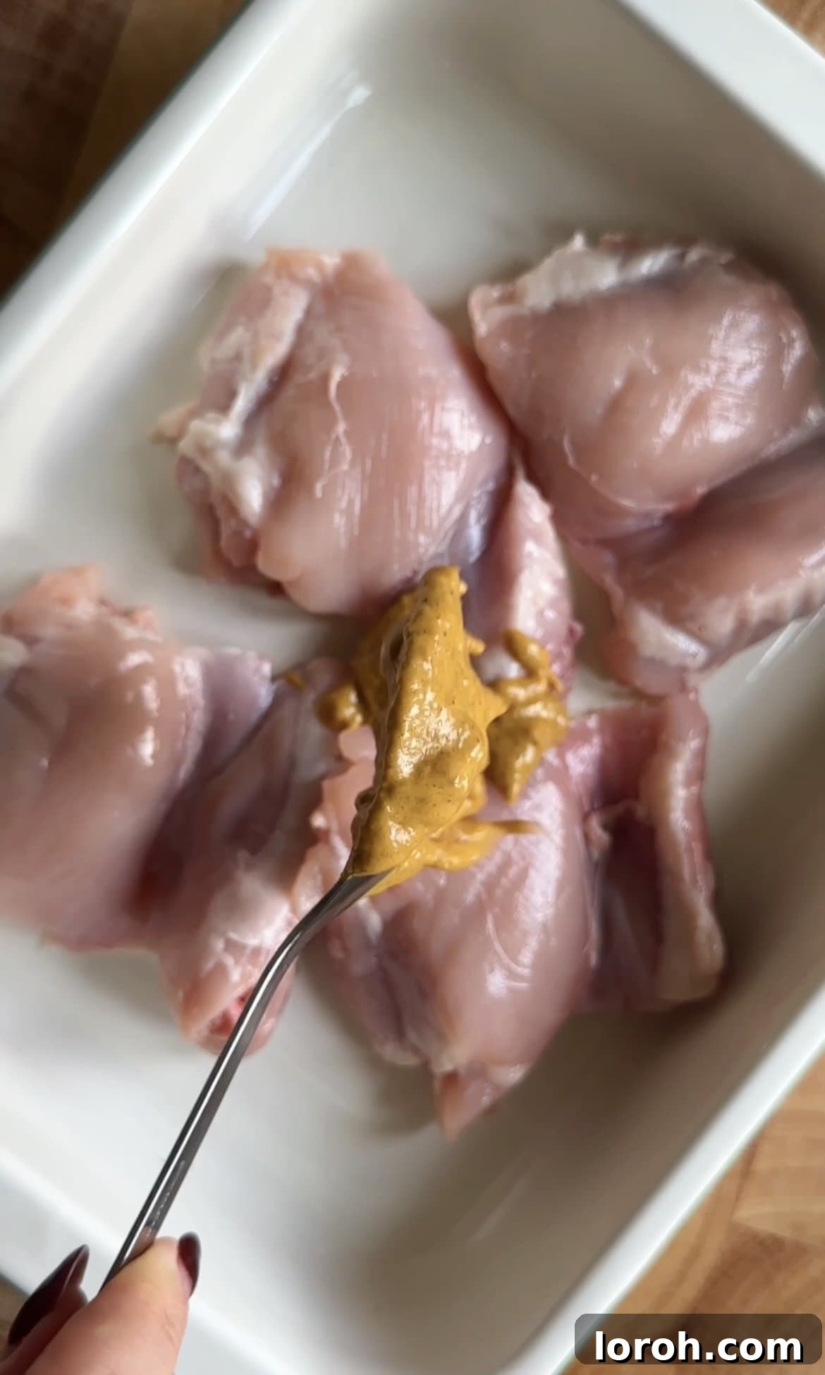 Chicken thighs coated with satay marinade