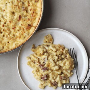 Baked Gouda Mac and Cheese with a crispy topping, ready to serve.
