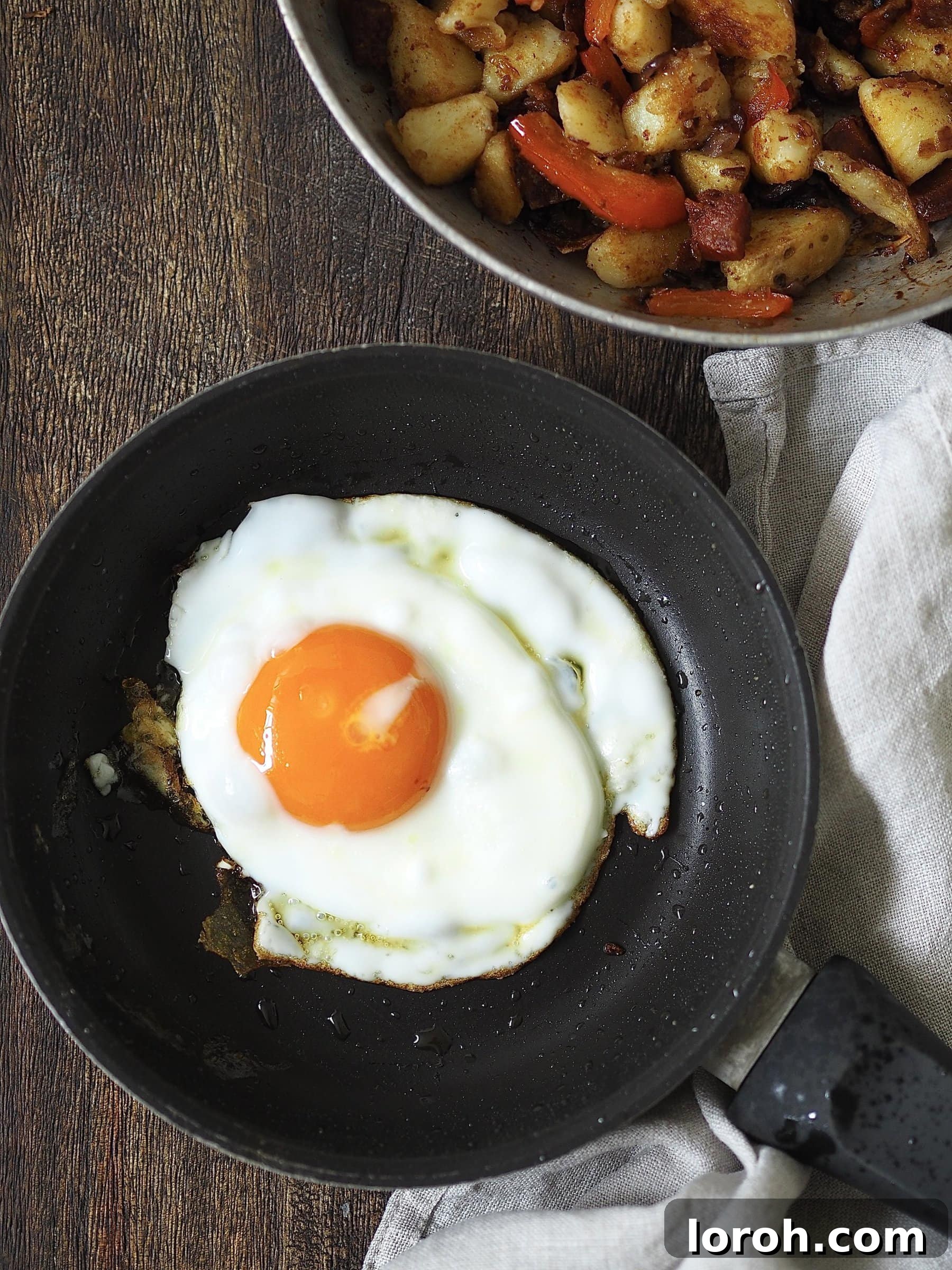 Spicy Chorizo and Golden Potato Morning Skillet 9 Frying a single egg in a separate small non-stick pan until the yolk is runny and edges are crisp.