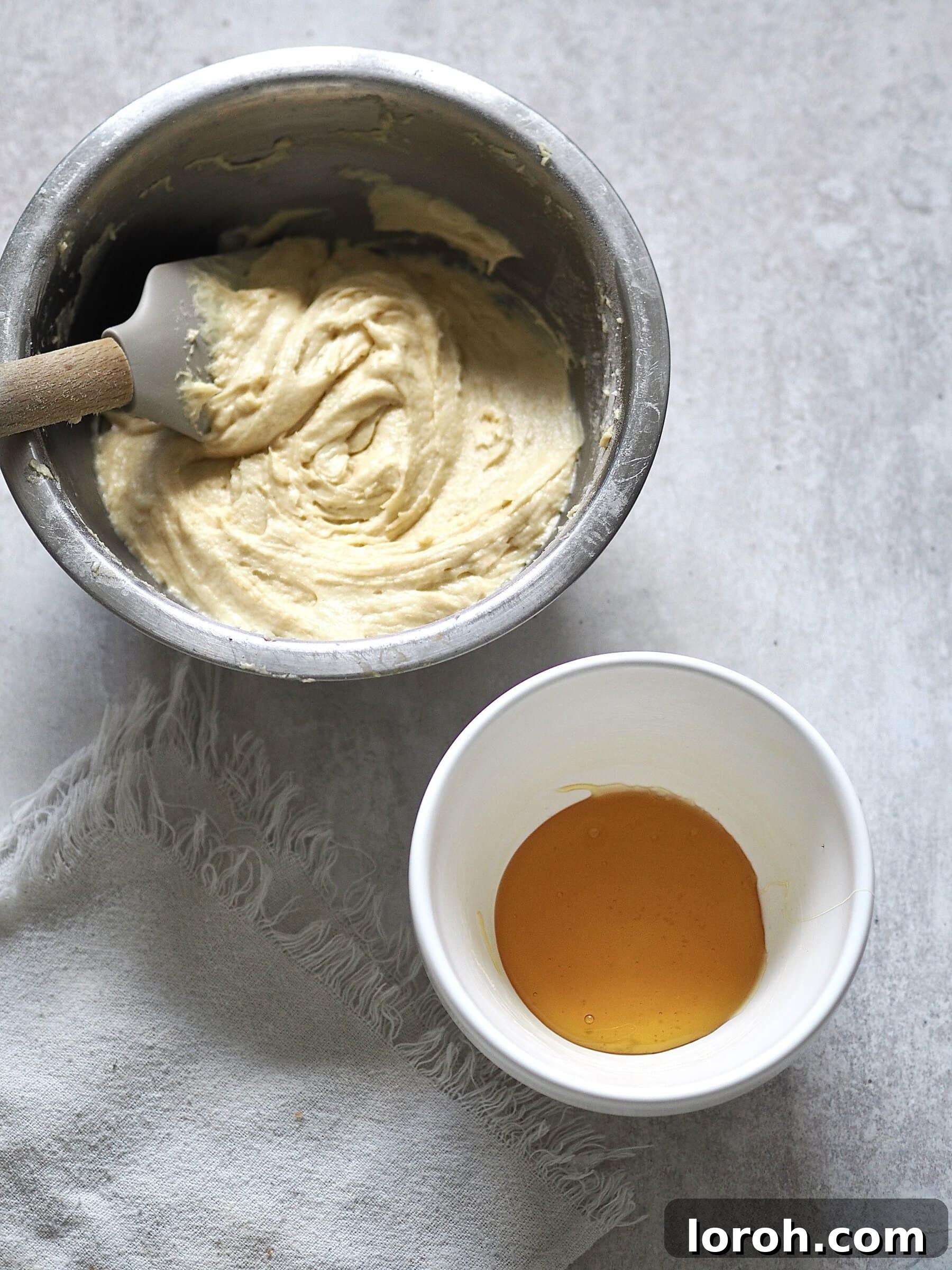 Spoon the golden syrup into the bottom of the prepared bowl and spread to cover the base. Spoon the batter on top.