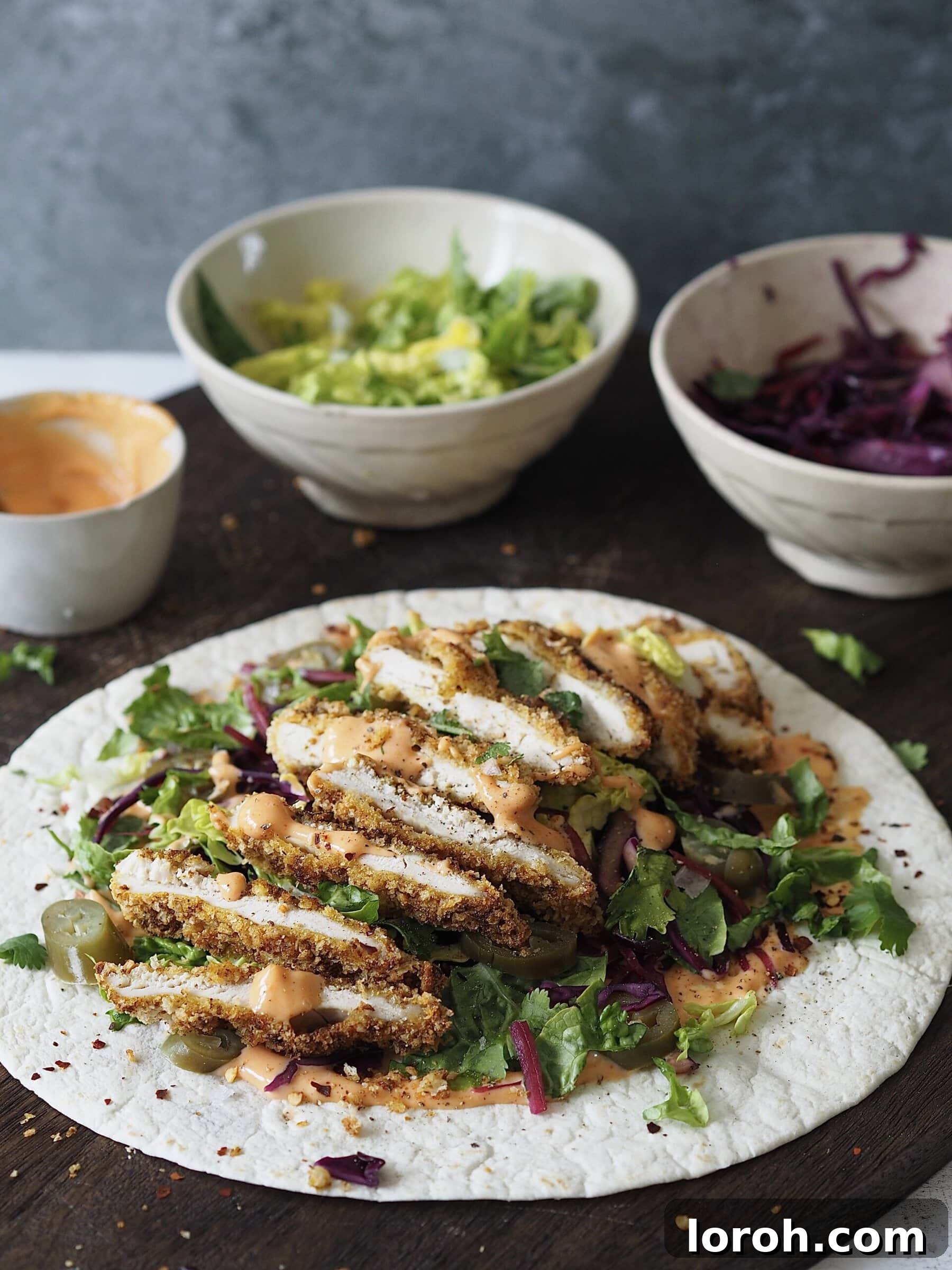 Katsu Crunch Wrap 2 Delicious Chicken Katsu Wrap, cut in half to show the filling