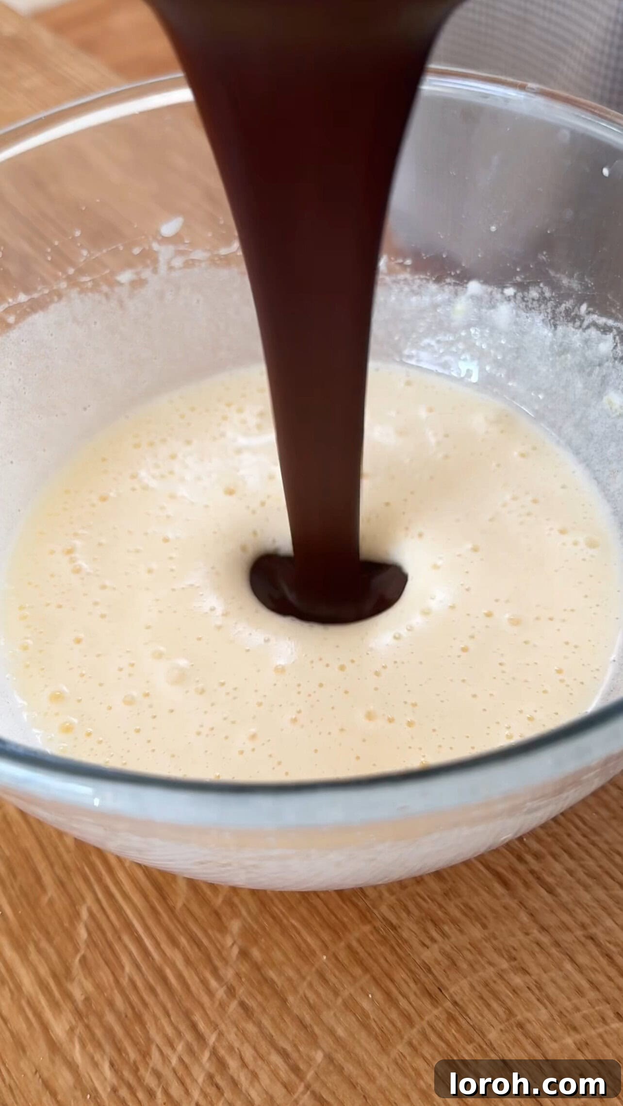 Decadent Brownie Tiramisu Cheesecake with Malted Whipped Bliss 6 Whisked eggs and sugars, pale and frothy, for the brownie batter of the Tiramisu Cheesecake.