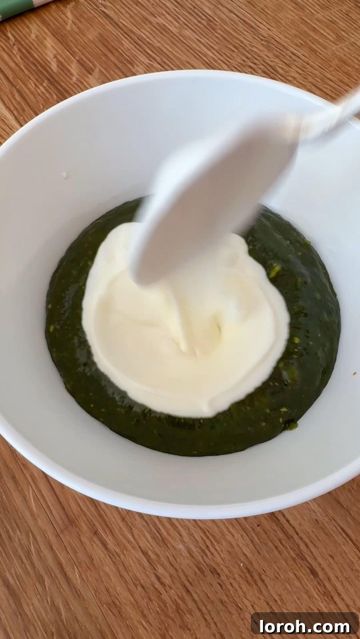 Creamy Chicken Macaroni Delight 8 stirring Greek yogurt into the freshly made pesto