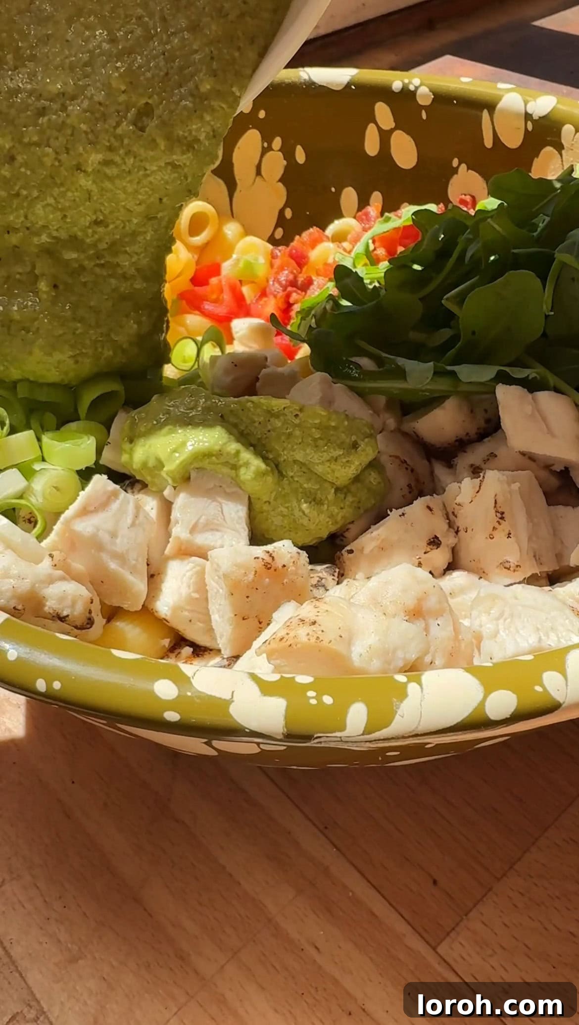 Creamy Chicken Macaroni Delight 9 tossing macaroni pasta with the creamy pesto dressing