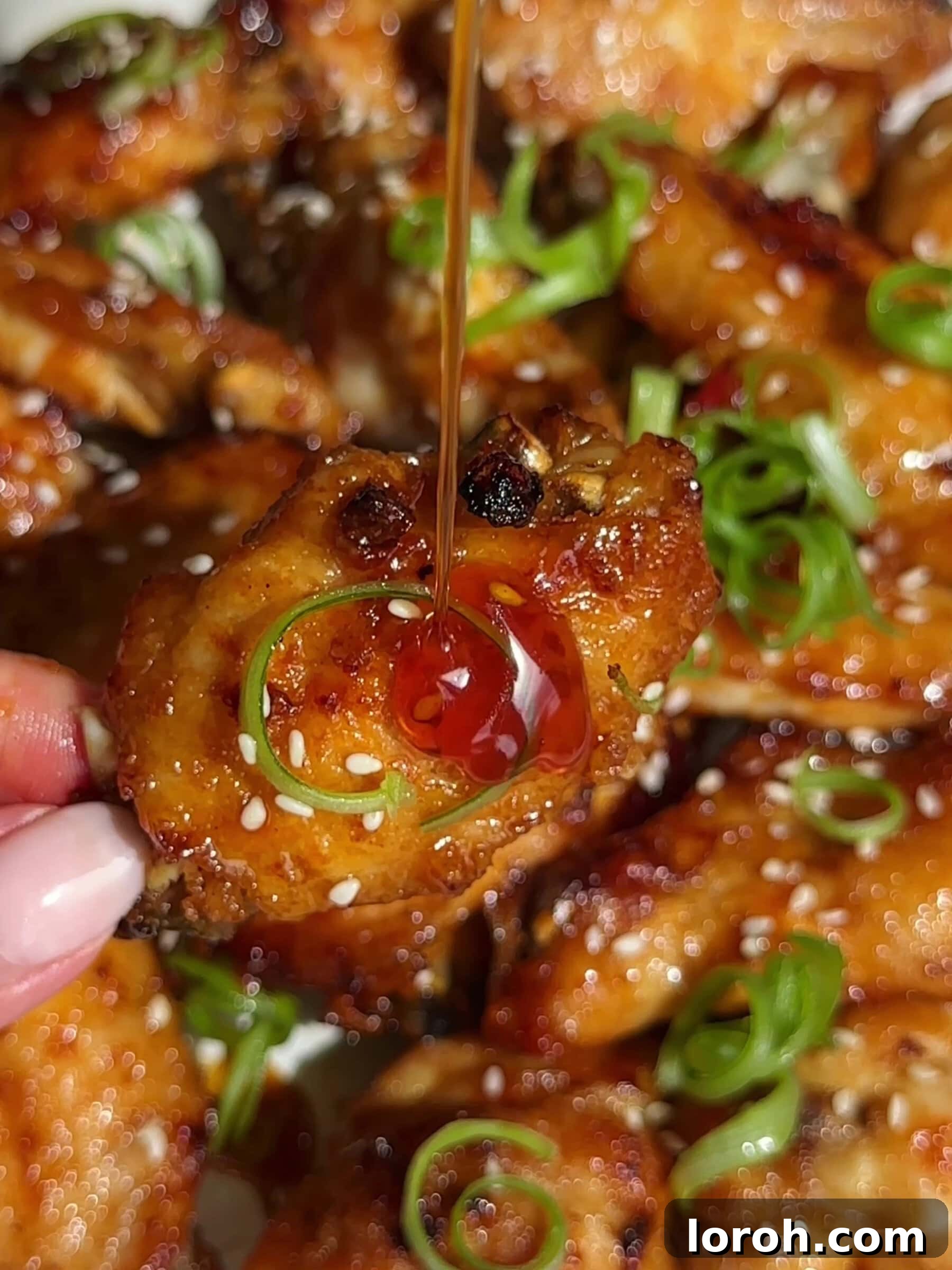 Beautifully glazed Hot Honey Chicken Wings, ready to be served.