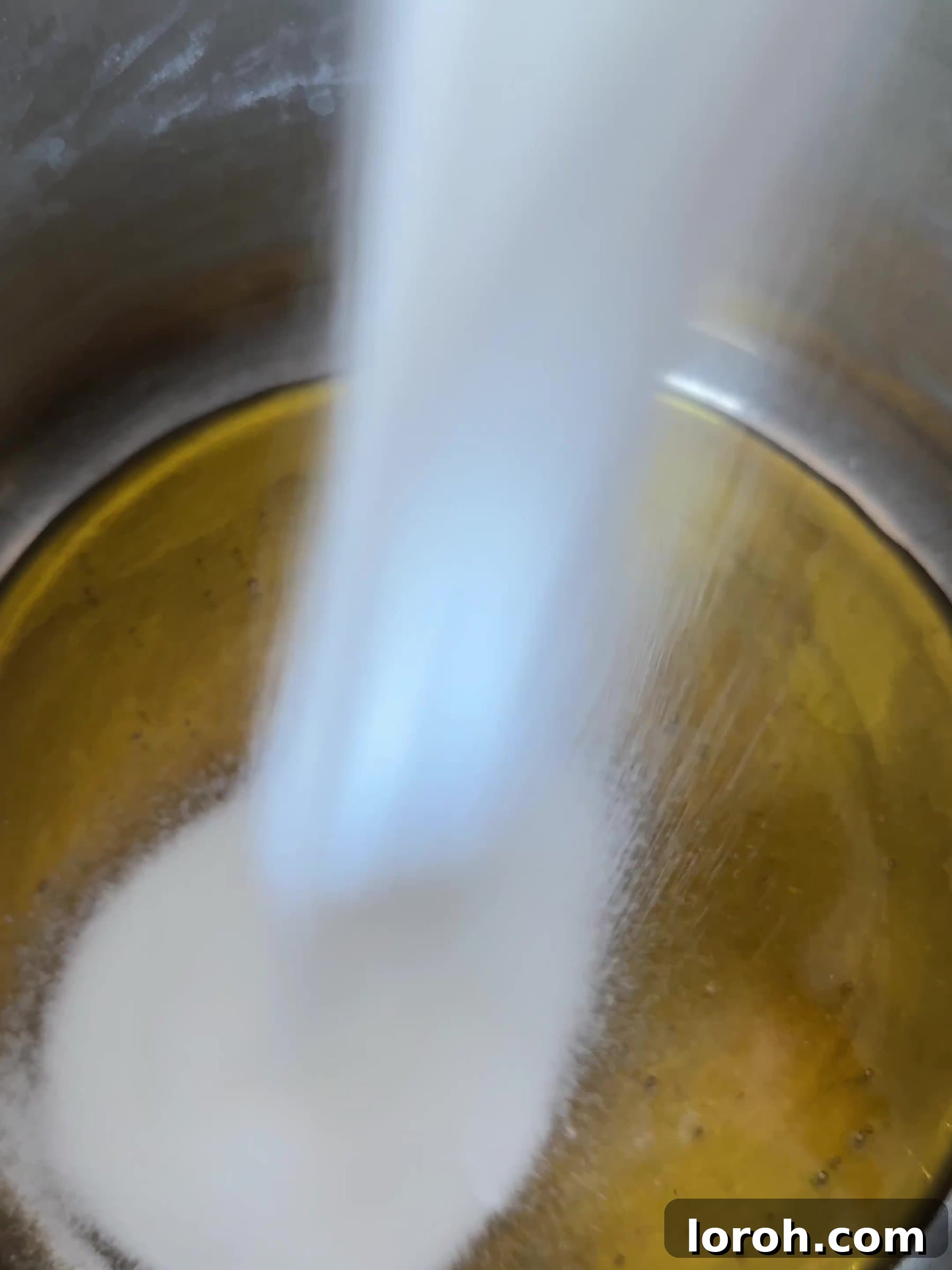Golden Honeycomb Crunch Ice Cream 4 Heating golden syrup and adding sugar in a saucepan