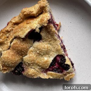 Decadent Blackberry Cream Cheese Pie 7 Blackberry Pie with Cream Cheese slice on plate
