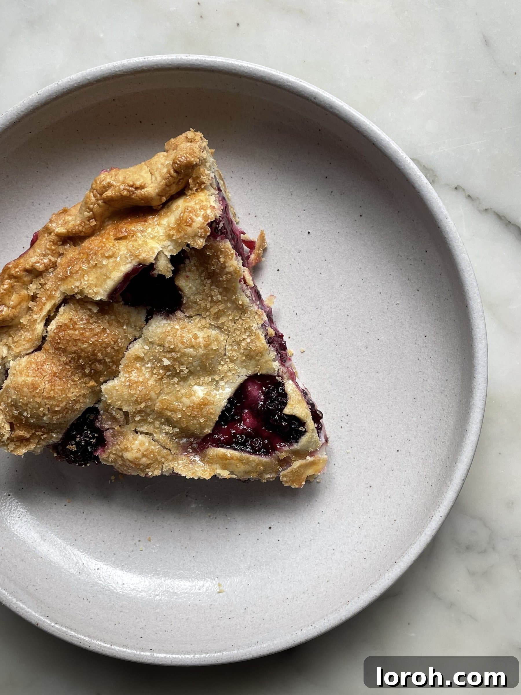 Decadent Blackberry Cream Cheese Pie 5 Perfect slice of Blackberry Pie with Cream Cheese on a plate