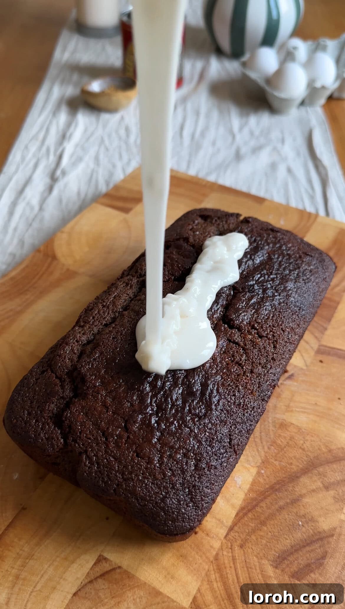 Island-Spiced Jamaican Ginger Cake 10 Spoon-drizzling ginger icing over the cooled Jamaican Ginger Cake.