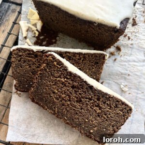 Island-Spiced Jamaican Ginger Cake 12 Slices of sticky Jamaican Ginger Cake on baking paper.