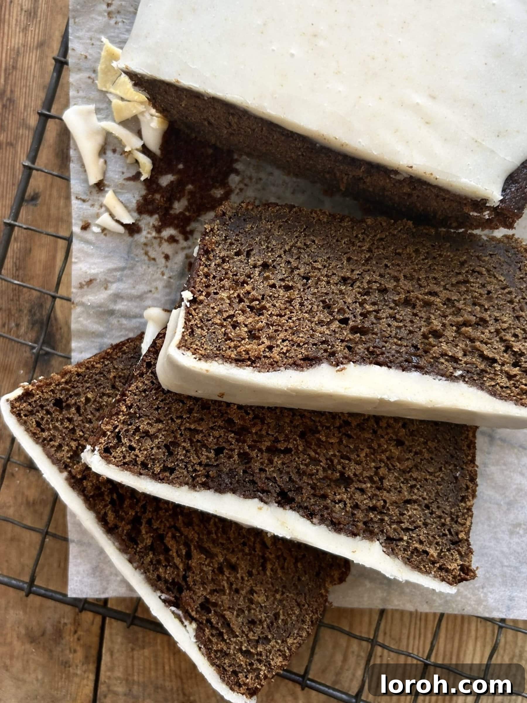 Island-Spiced Jamaican Ginger Cake 3 Close-up of a moist slice of Sticky Jamaican Ginger Cake, showcasing its rich texture.