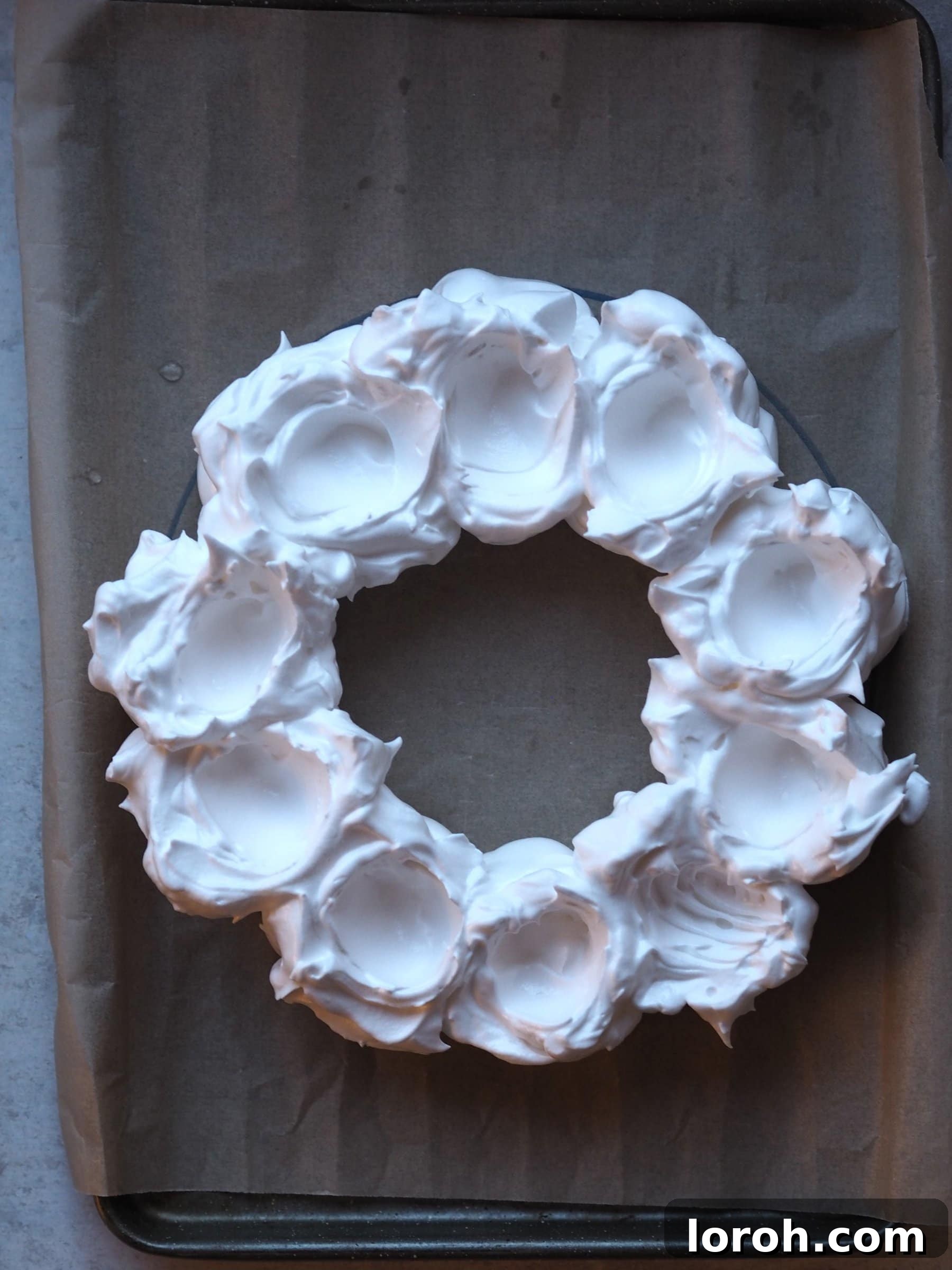 Festive Meringue Wreath 11 Flattening the meringue with a spoon