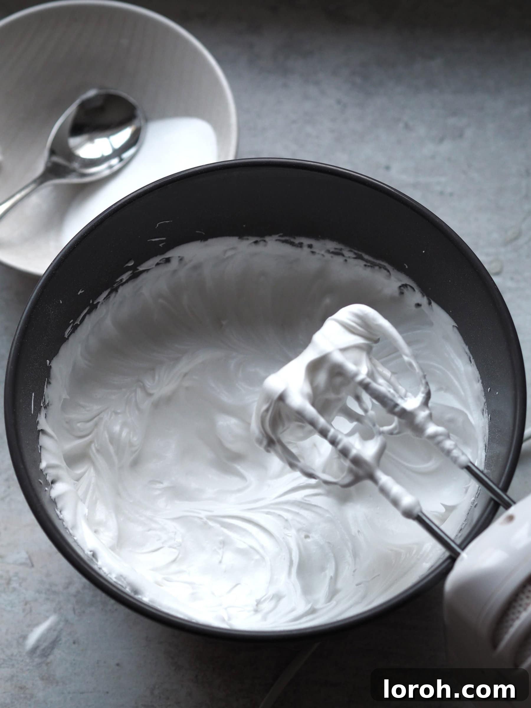 Festive Meringue Wreath 8 Whisking eggs with an electric blender