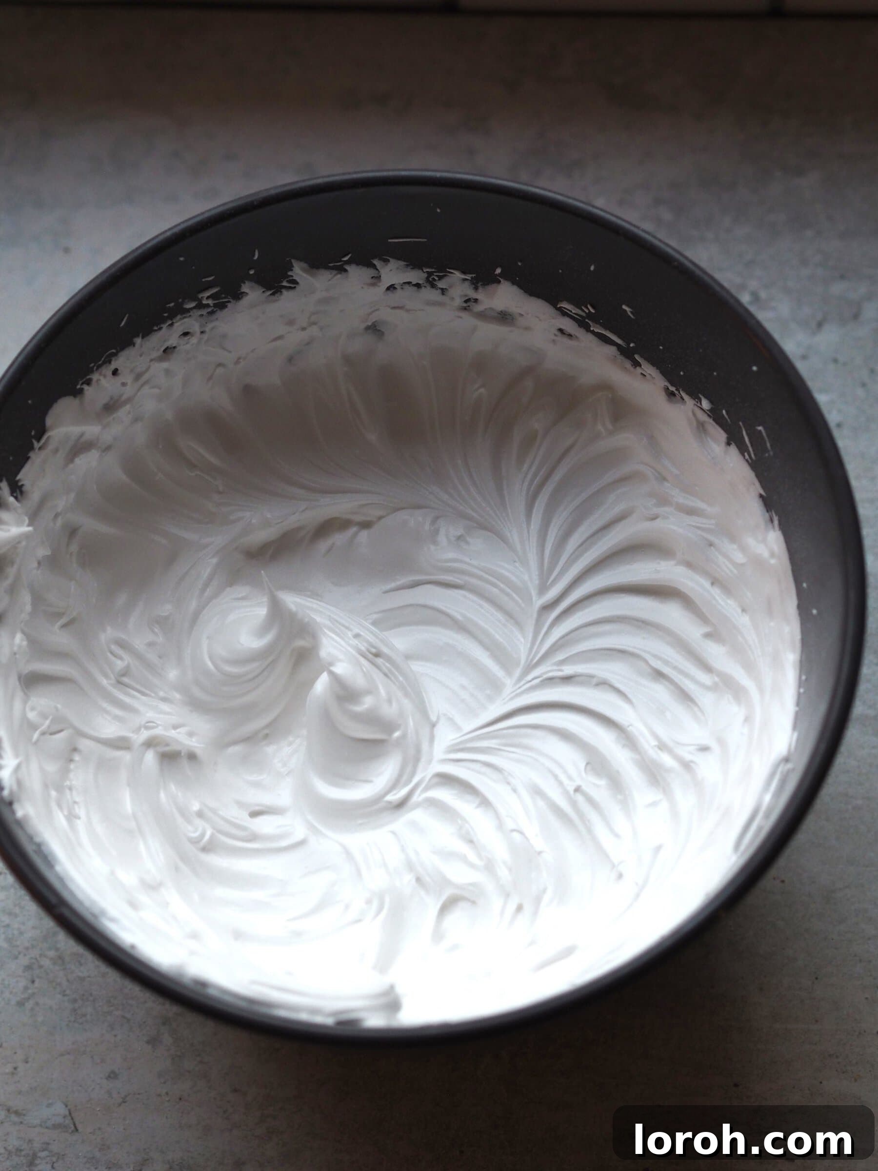 Festive Meringue Wreath 9 Whisked egg whites in a bowl