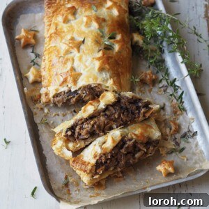 Baked Nut Roast Wellington on a baking tray, ready to serve