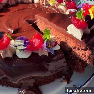 Slicing a piece of the Chocolate Cake with a knife.