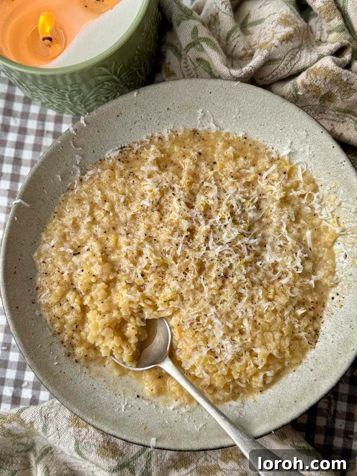 Velvety Easy Pastina 3 A second view of a bowl of creamy pastina, highlighting its rich texture and steam rising from the warm dish.