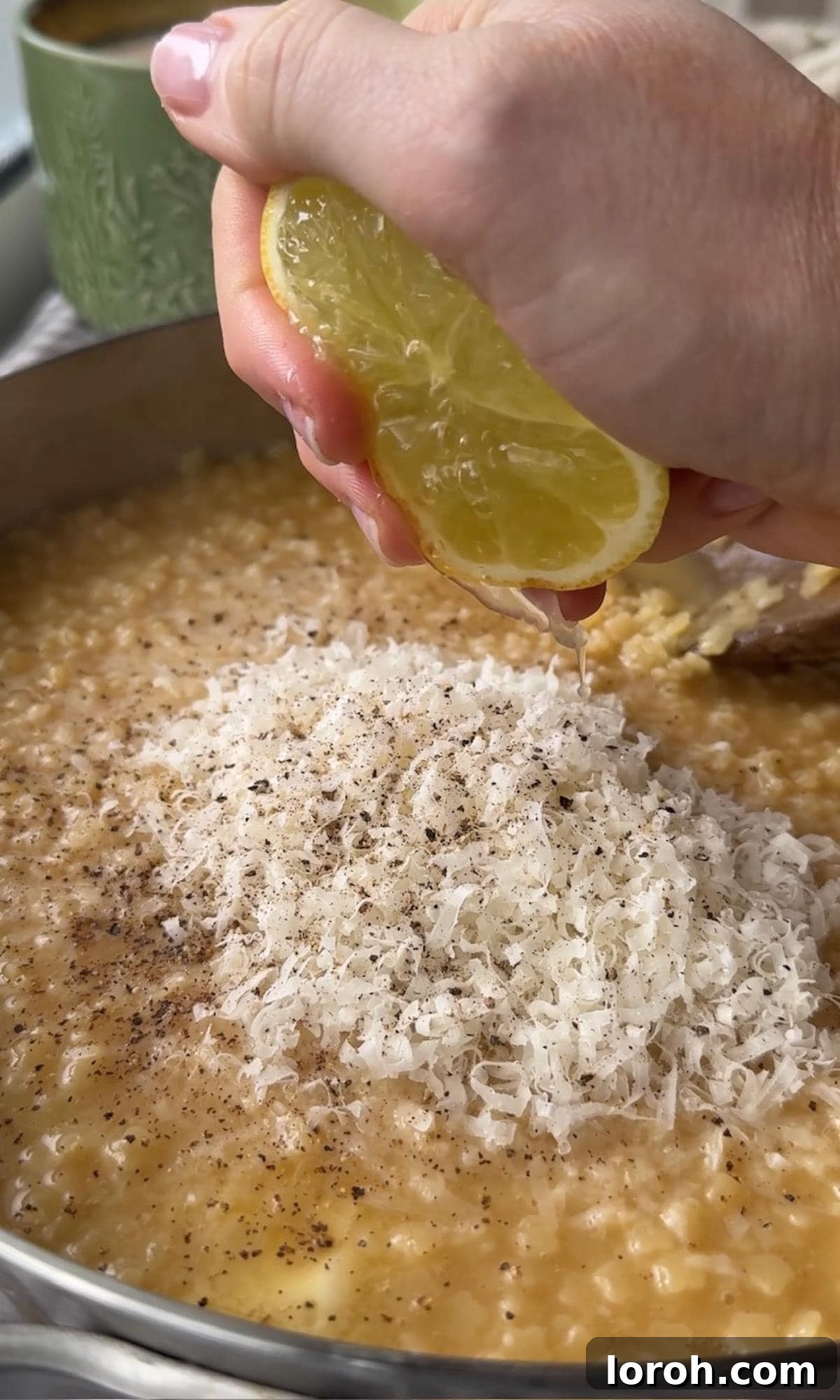 Velvety Easy Pastina 6 Adding a fresh squeeze of lemon juice to the cooked pastina.