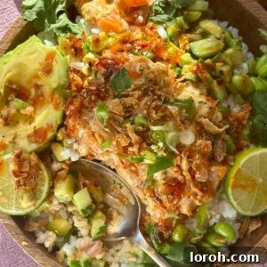 salmon bowls with sushi rice, lime and spring onion.