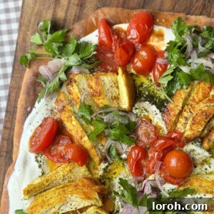 chicken flatbread on wooden board